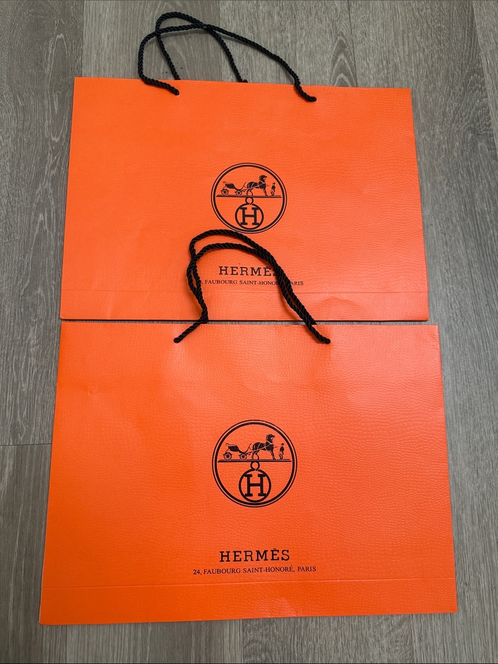 2 Bundles of Hermes Orange Shopping Bags with Black Rope Handles